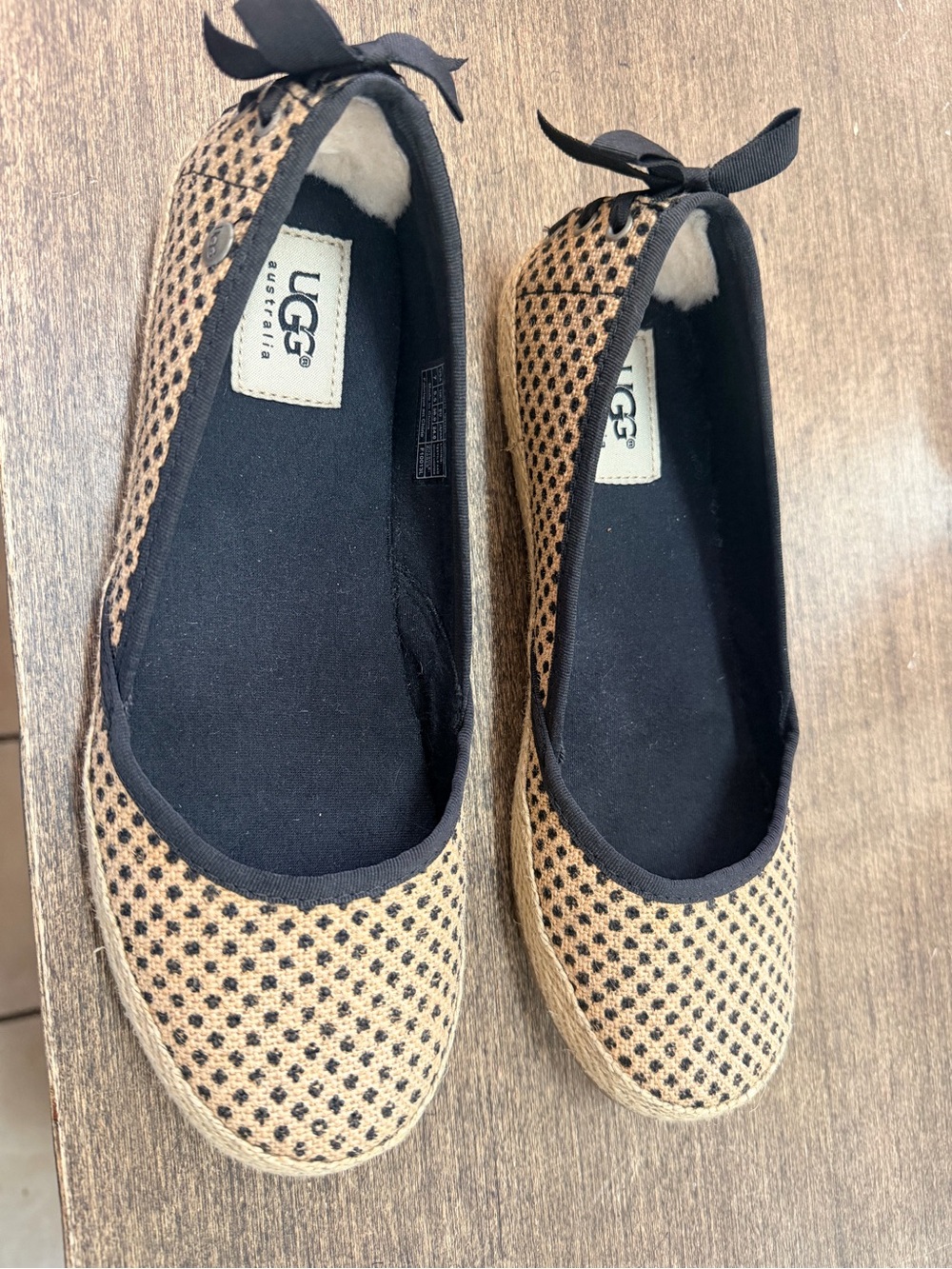 UGG Women's Black and Tan Woven Ballet Flats with Bow